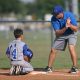 pexels-photo-264337 - Washington Morning man kneeling on baseball field beside man