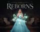 Poster for The Reborns: a woman in a glowing blue ballgown holds an envelope, surrounded by magical sparks in a dim, elegant room.