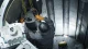 Worker assembling components inside a nuclear microreactor during construction