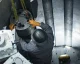 Worker assembling components inside a nuclear microreactor during construction