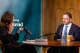 Daron Acemoglu being interviewed at a table for Bloomberg Weekend