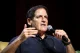 Mark Cuban speaking into a microphone at an event
