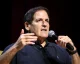 Mark Cuban speaking into a microphone at an event