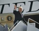 Trump waving from the steps of Air Force One
