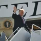 Trump waving from the steps of Air Force One